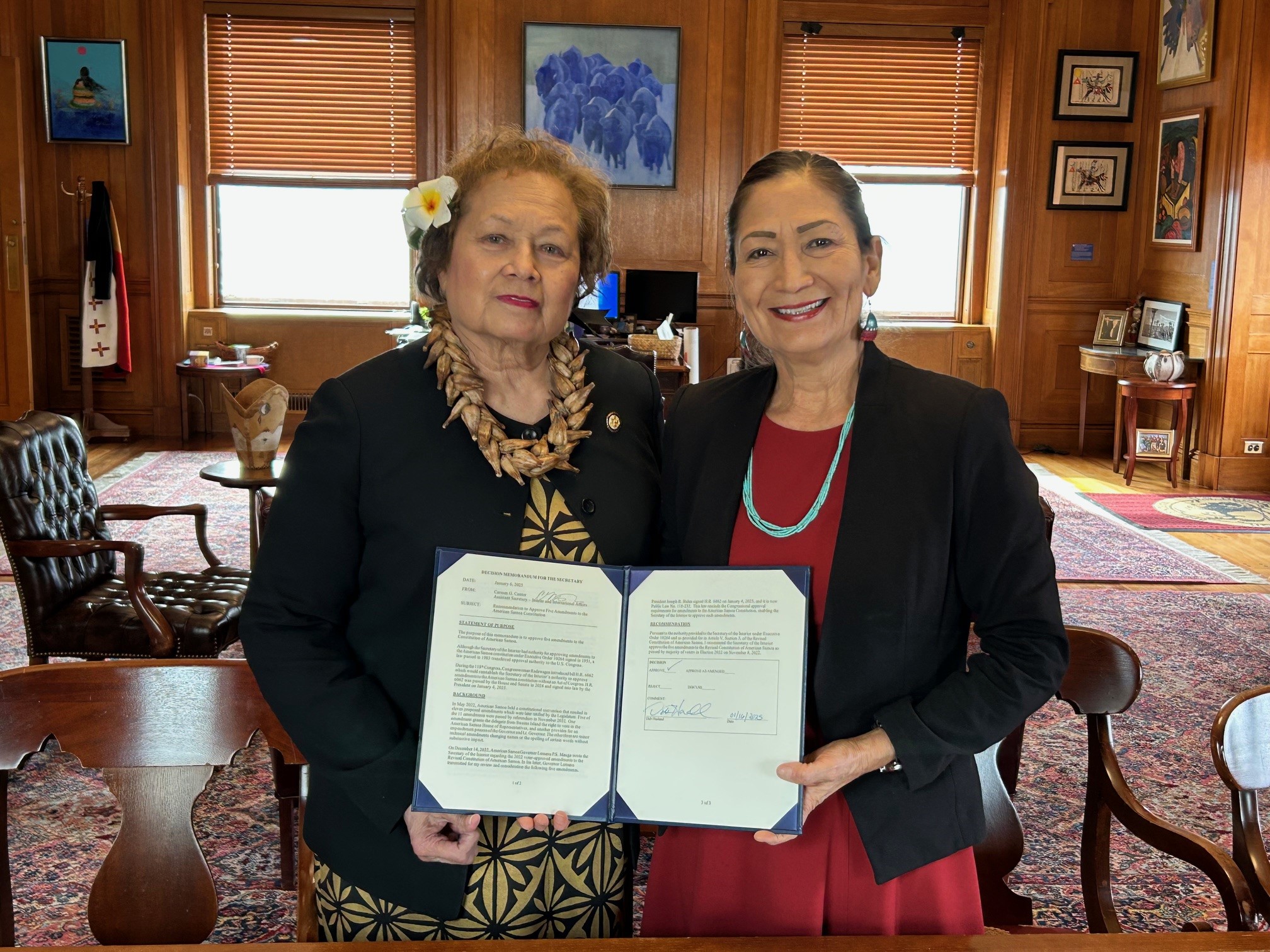 Congresswoman Amata and Secretary Haaland with signed Decision Memorandum finalizing American Samoa's amendments
