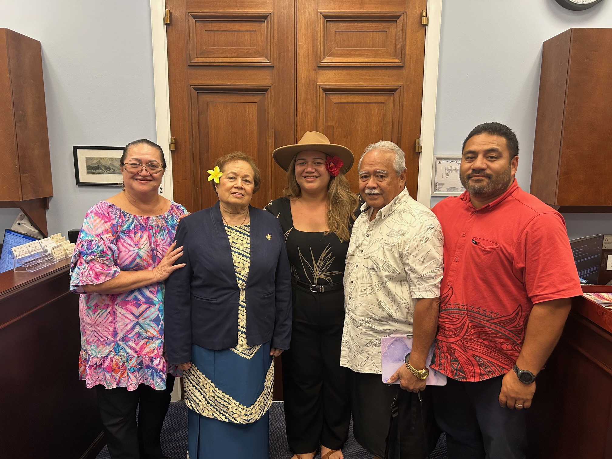 Congresswoman Amata, Teacher of the Year Mikaela Saelua, Leone High, her parents Rep. Fiu and Catherine Saelua, and Leone alumnus Emau Stephen Petaia