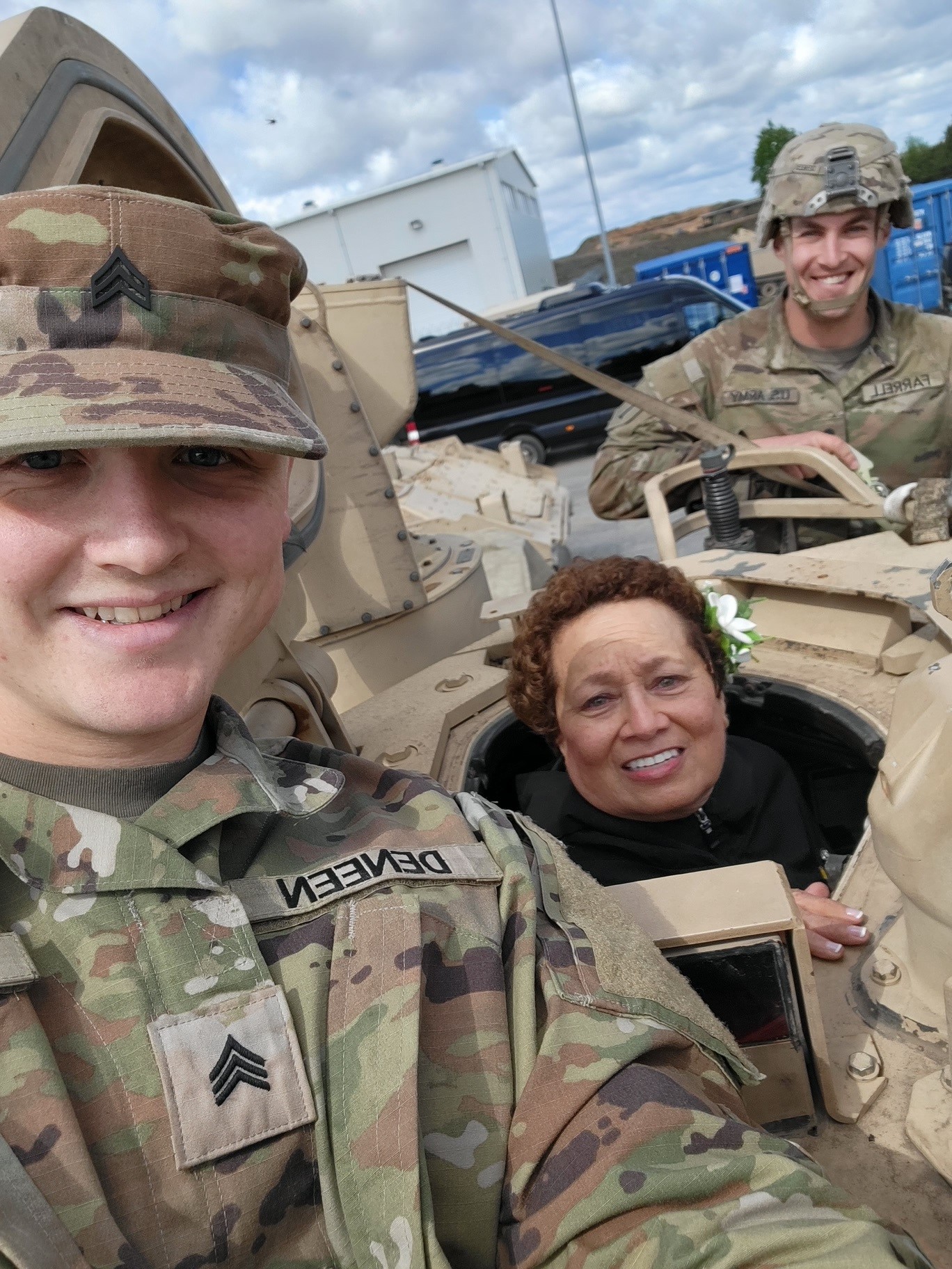 Soldiers showing me around US Army equipment
