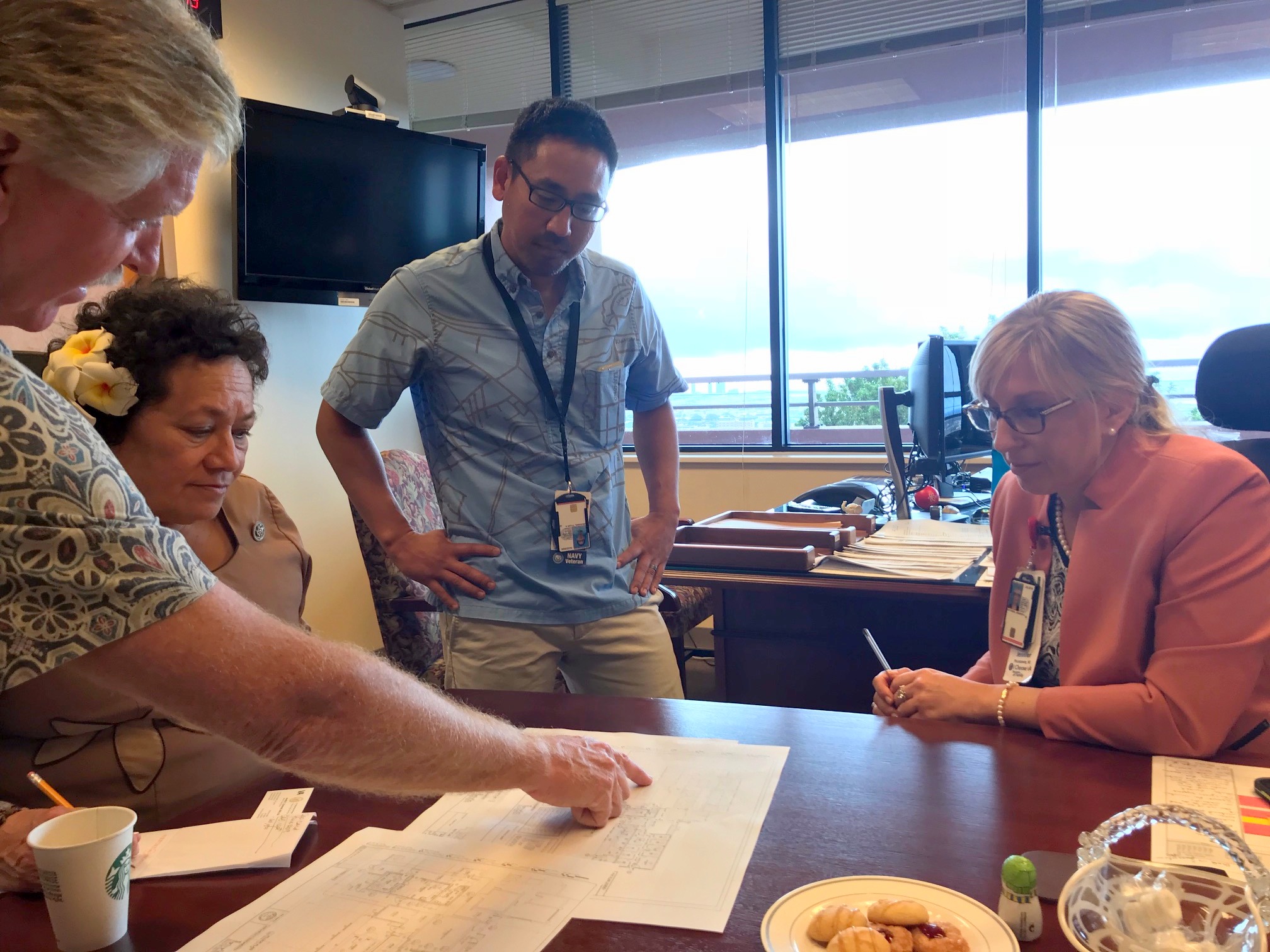 Amata discussing Veterans' health services at Tripler Center