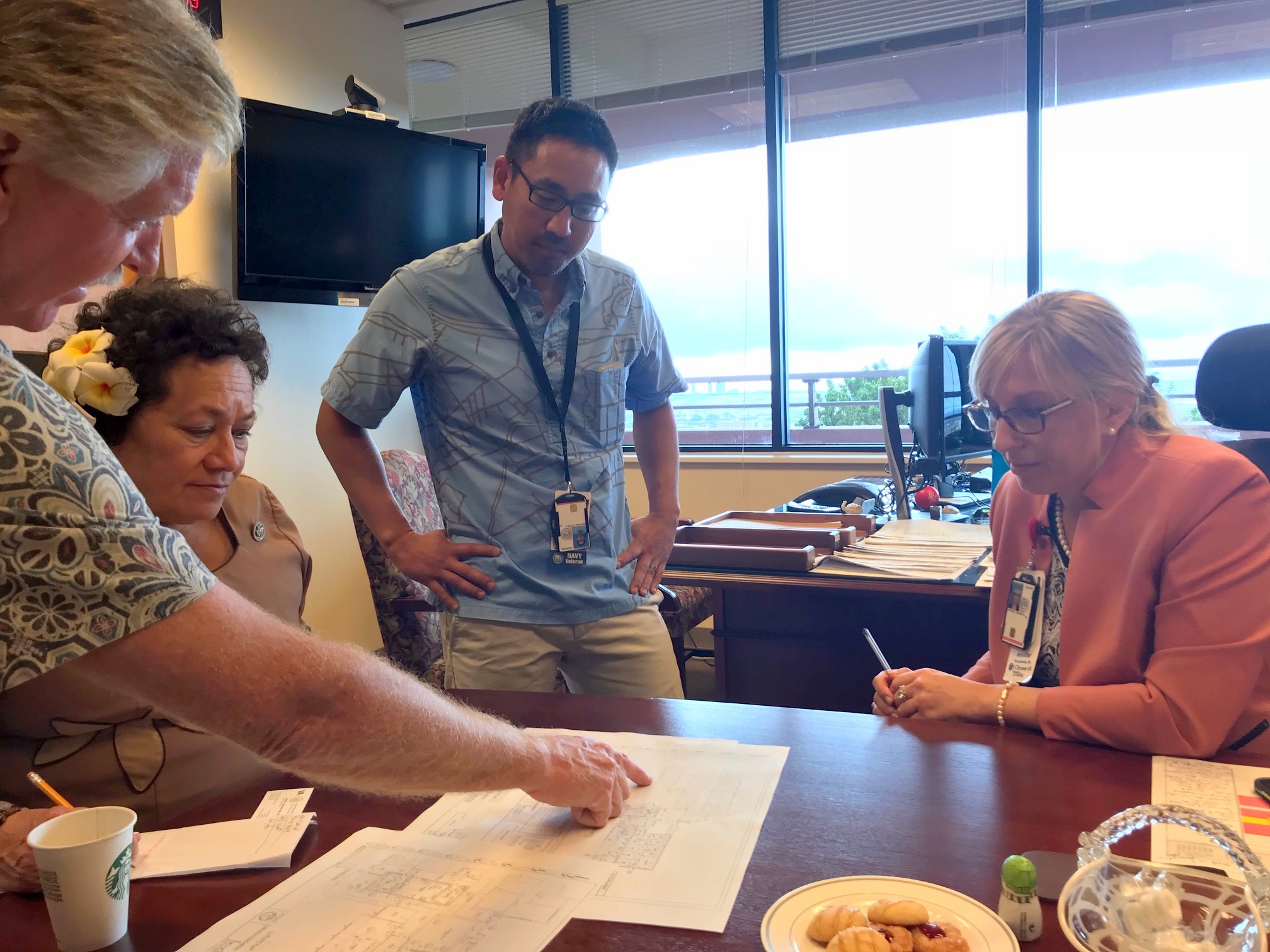 Amata discussing Veterans' health services at Tripler Center