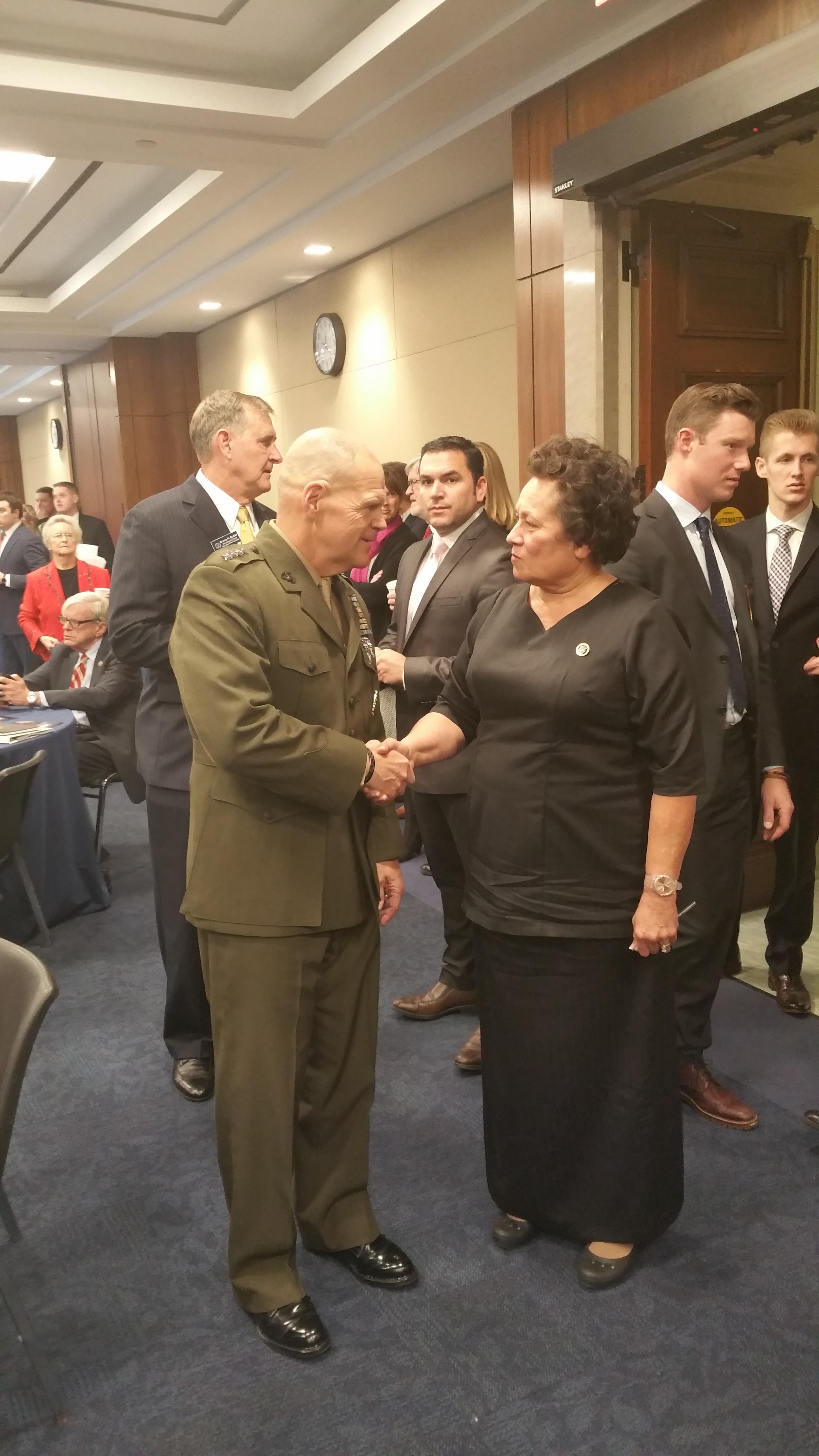 Amata speaks with Commandant Neller 