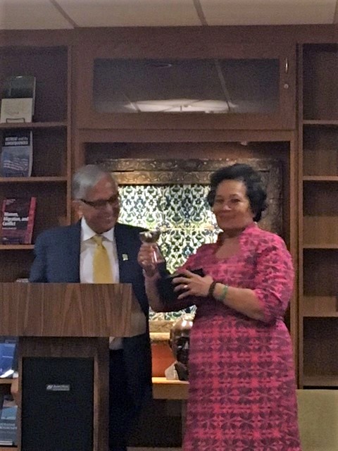 Dr Underwood presents Congresswoman Amata with the 2017 Distinguished Alumnus award