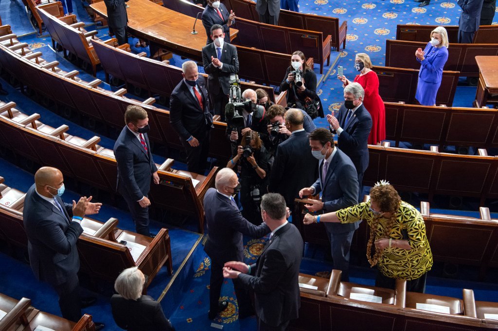 President Biden and Congresswoman Amata fistbump on the floor of Ho