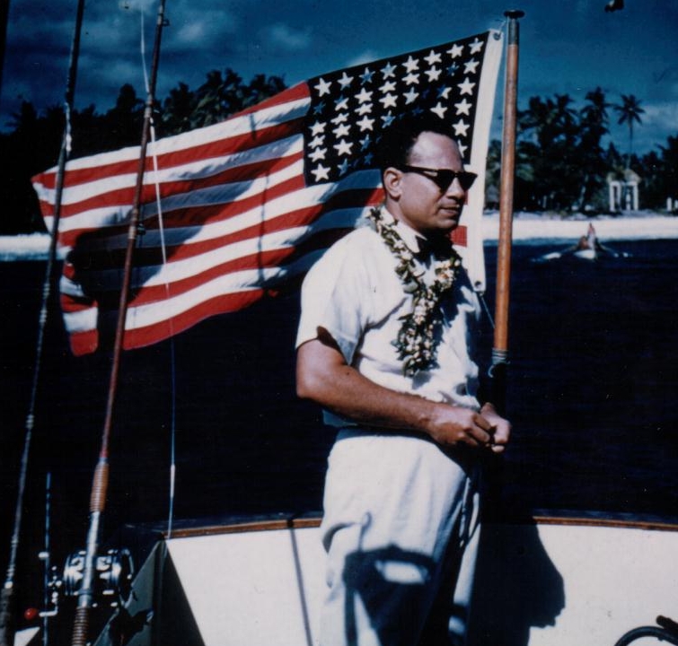 The US flag is prominent in this historic 1957 photo of Gov. Uifa'atali Peter T. Coleman in Tutuila