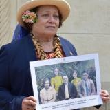 Holding Henry Saaga family photo