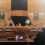Subcommittee hearing on human rights concerns, Chairman Smith (center), Congresswoman Amata (left)