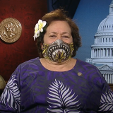 Amata taping PSA to welcome repatriation flight and encourage vaccines