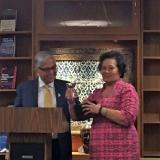 Dr Underwood presents Congresswoman Amata with the 2017 Distinguished Alumnus award