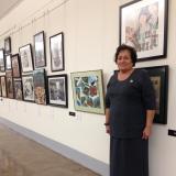 Congresswoman Aumua Amata stands with the winning Submissions from the 2014 Competition in the Tunnel that Connects the Cannon House Office Building to the U.S. Capitol.  Countless visitors to the Capitol pass through this hallway each year