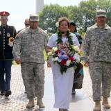 Amata walking with wreath