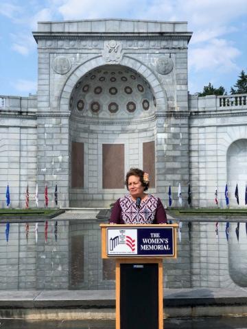 (File photo) Congresswoman Amata speaking in front of the Women's Memorial at a Wreath Laying
