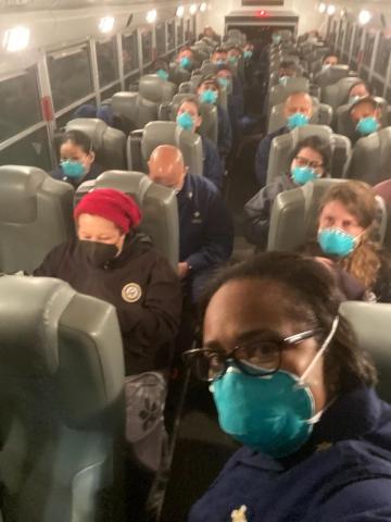 Aboard the FEMA charter flight in early March with personnel from multiple federal agencies