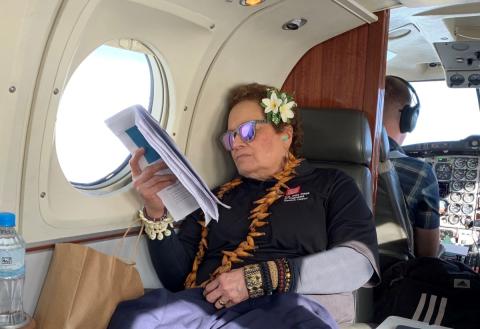 Amata on the military flight leaving Papua New Guinea