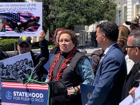 Amata speaking at Veterans event