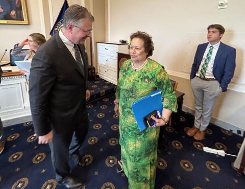 Assistent Secretary Kritenbrink and Congresswoman Amata conversing while the hearing was not in session crop