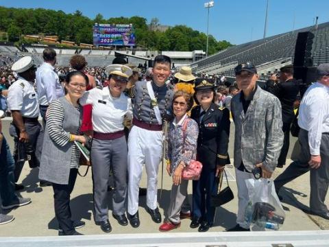 L to R - Graduate's mother Hye Ryeon Koun, First Cadet Jang, Graduate Cadet Seung Ju Myung, Major Han, graduate's father Jae Uhng Myung