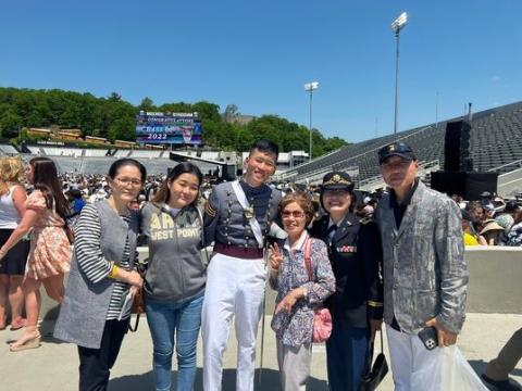 L to R - Graduate's mother Hye Ryeon Koun, sister Diana Myung, Graduate Cadet Seung Ju Myung, Major Han, graduate's father Jae Uhng Myung