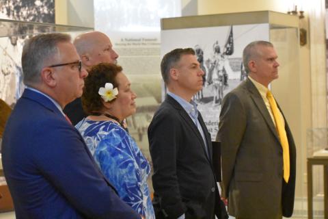 L to R - Reps Bost, Aumua Amata, Roy, Banks, and Rosendale during a briefing at Arlington National Cemetery