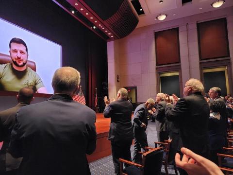 Members of Congress applaud President Zelensky who addressed Congress remotely
