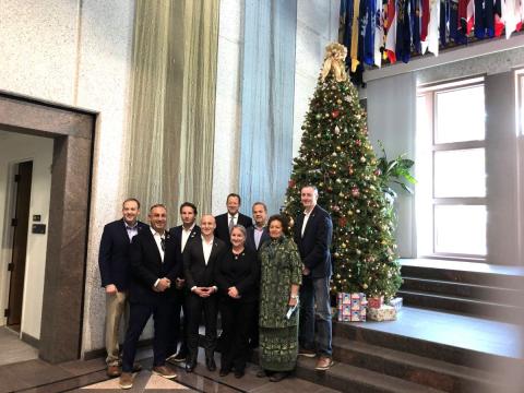 Rep. Zeldin (pictured at left end of the group) and Rep. Amata on Christmas Eve during CODEL to visit military stationed in the Middle East (file photo)