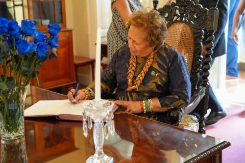 Signing the guest book for the ceremony in Barbados