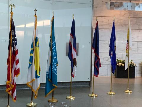 The flags of the territories, along with the US flag and those of the Smithsonian and Museum