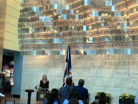 The presentation of the American Samoa flag with Museum Director Dr. Anthea Hartig