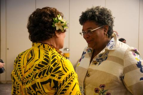 Congresswoman Amata speaking with Prime Minister of Barbados Mia Mottley earlier this year