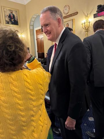 Amata speaking with Tony Greubel