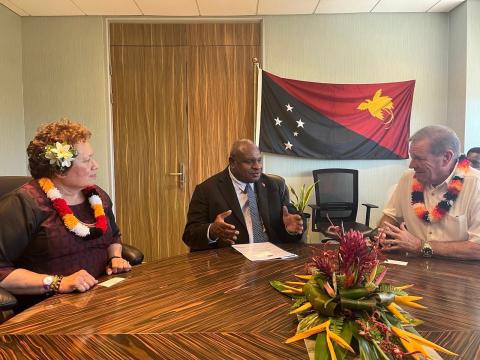 Reps Amata and Neal Dunn meeting with Secretary of the Ministry of Foreign Affairs Elias Wohengu, in Papua New Guinea, to discuss diplomatic and economic cooperation