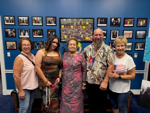 Winning artist Eve Snow and her family in Congresswoman Amata's office in DC