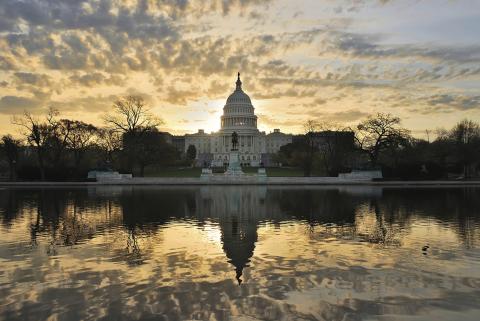 US Capitol Building with sunrise sky