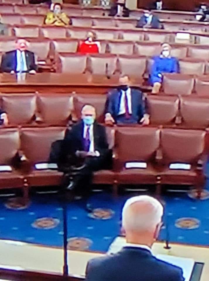 Amata in the House of Representatives as President Biden speaks