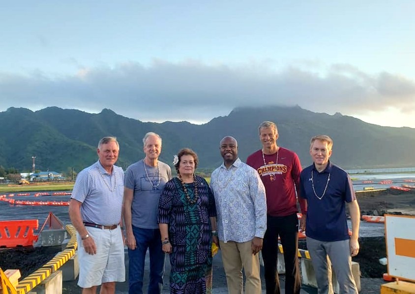 Amata with five key US Senators at airport