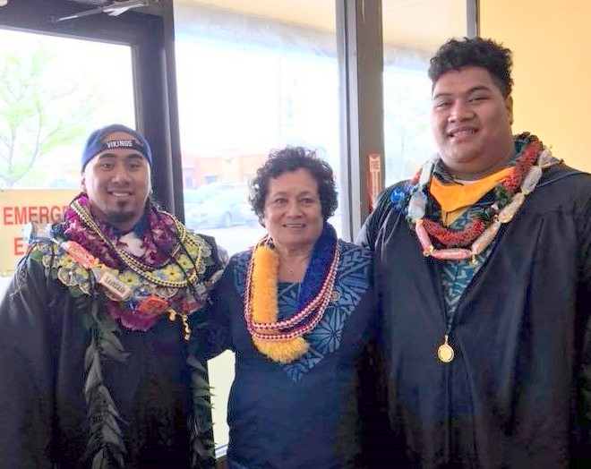 Amata with graduates at North Park University