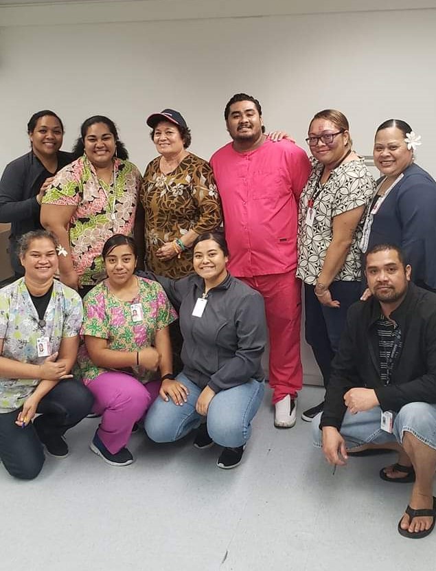 Amata with the Pharmacy staff