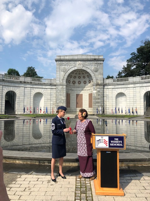 Congresswoman Amata honoring Chief Armga in front of the Memorial