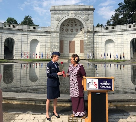 Congresswoman Amata honoring Chief Armga in front of the Memorial