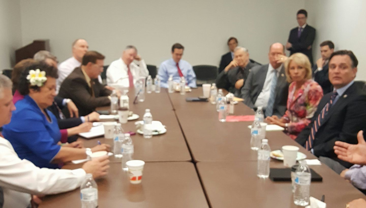 Secretary DeVos is across the table from Congresswoman Amata at an education policy meeting at the Capitol