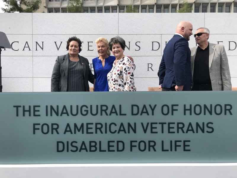 Amata with philanthropist Lois Pope, and Rep. Lois Frankel. Also pictured, veterans Paul Rieckhoff and Don Overton.