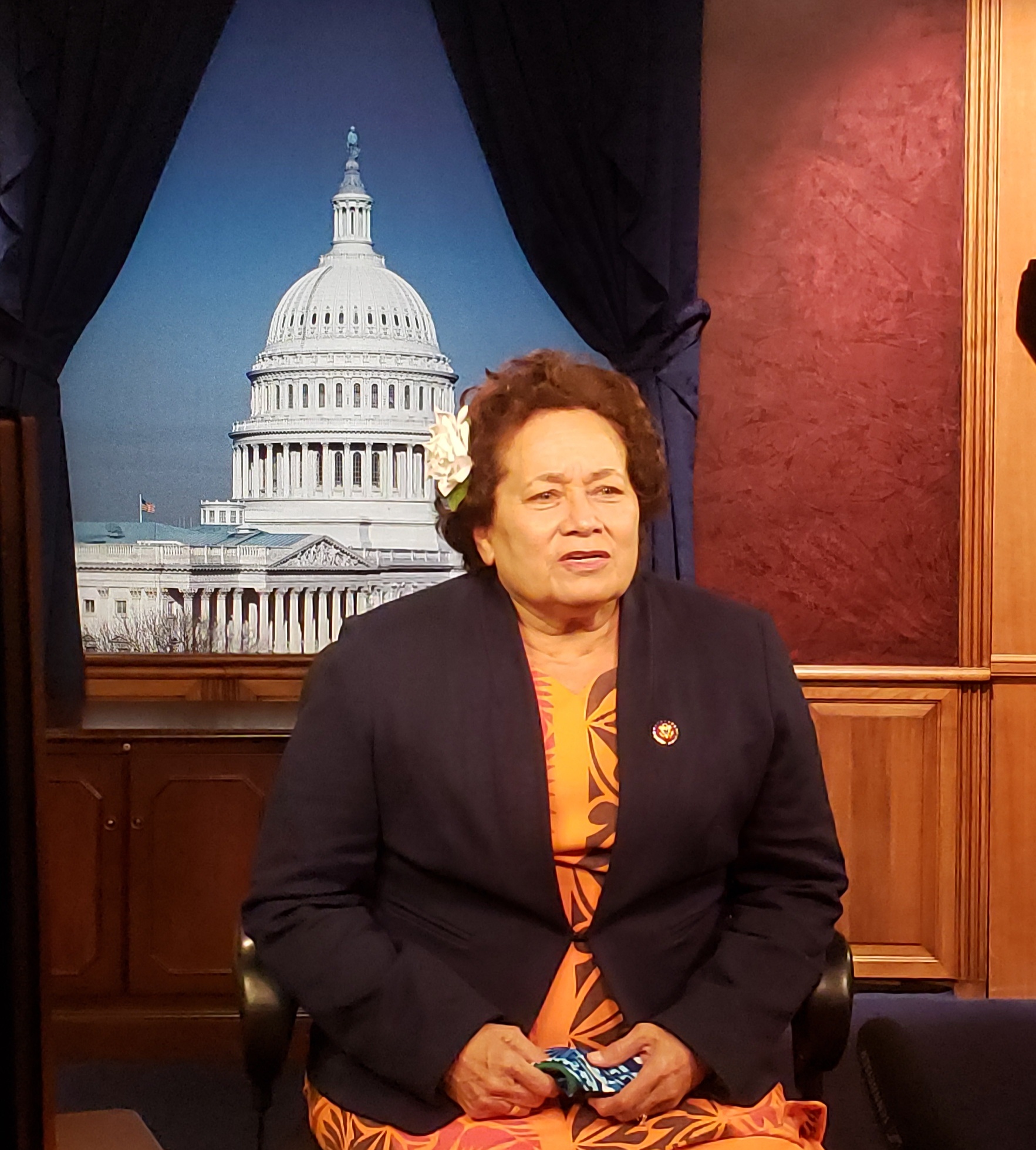 Congresswoman Amata recording a message at Rayburn House Office Building