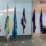 The flags of the territories, along with the US flag and those of the Smithsonian and Museum