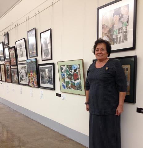 Congresswoman Aumua Amata stands with the winning Submissions from the 2014 Competition in the Tunnel that Connects the Cannon House Office Building to the U.S. Capitol.  Countless visitors to the Capitol pass through this hallway each year