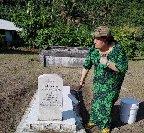 Cleaning and preserving the historic marker for Seaman Tafeaga of Manu'a