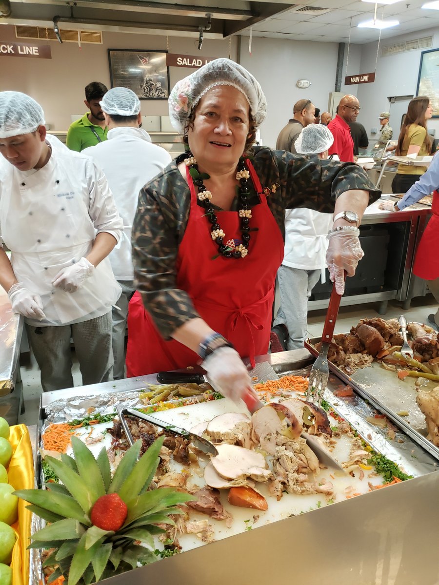 Carving turkeys for the troops' Christmas meals