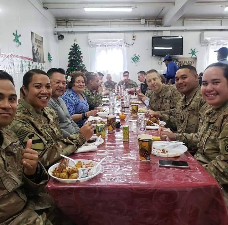 Enjoying dinner with troops