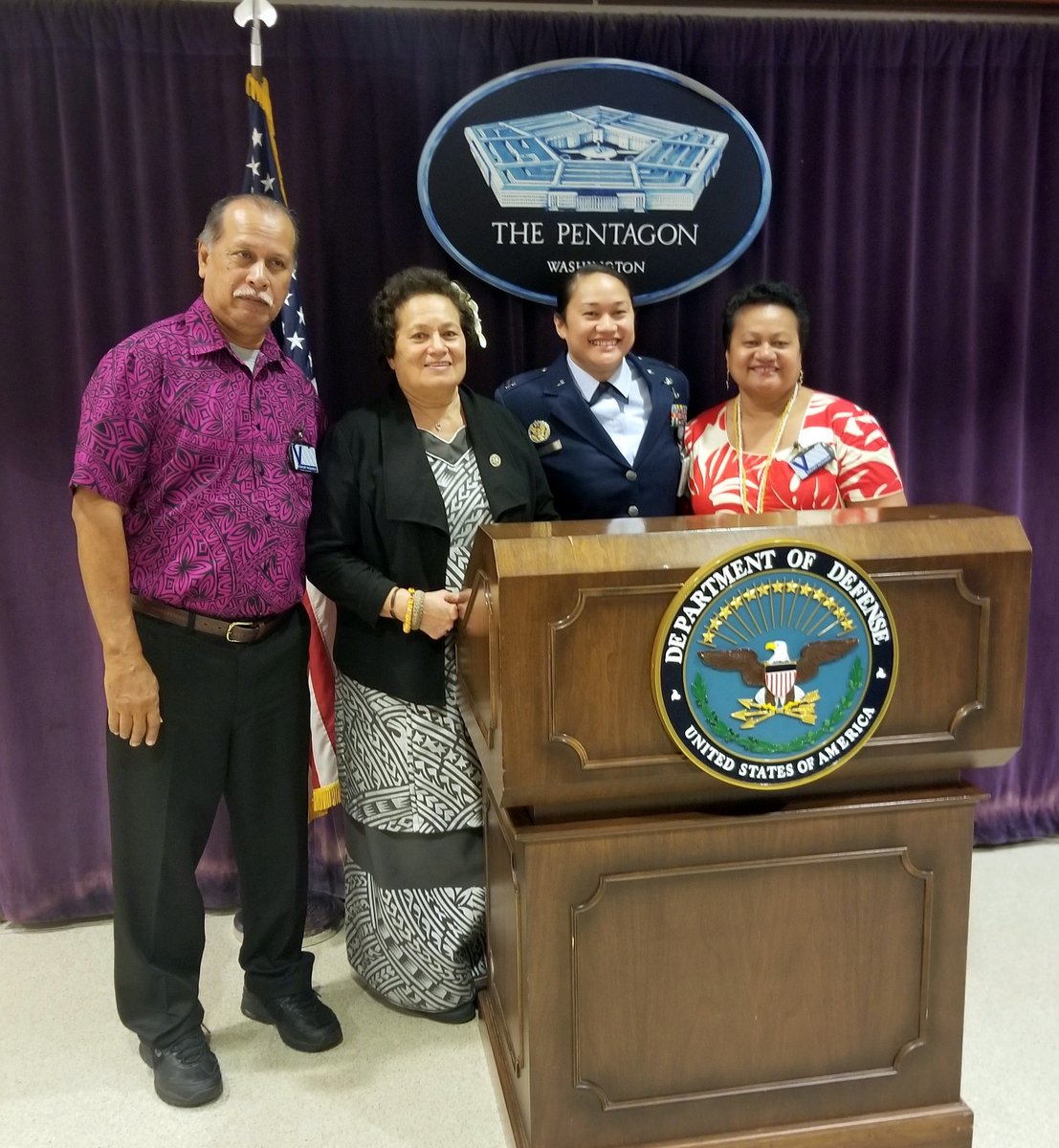 Cong. Aumua Amata congratulates newly promoted Major Mercy Te'o with her parents Su'a Philo and Mrs. Jennings